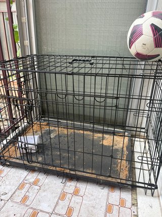 Jaula para conejo negra