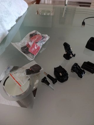 Custodia, telecomando, caricabatterie GoPro