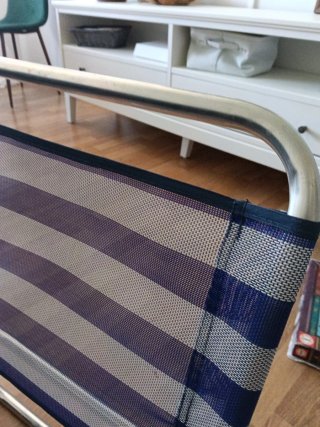 Silla plegable playa azul y plateada Corte inglés.