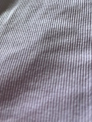 Top morado tirantes botones falso