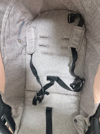 Triciclo y cochecito paseo infantil