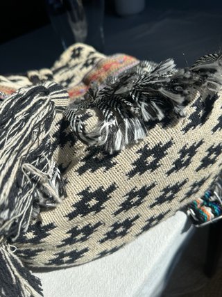 Mochila Parfois étnica flecos