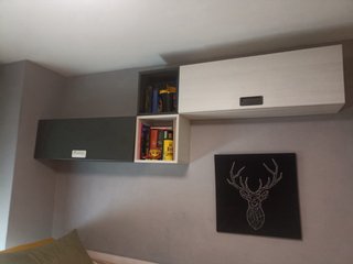 Cama nido con cajones y muebles de pared