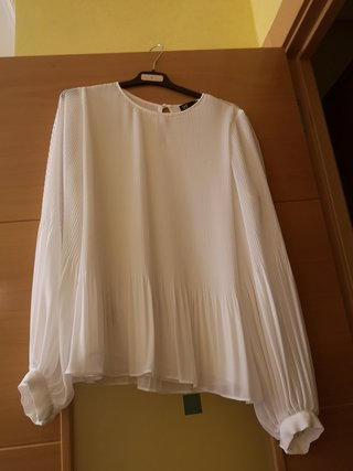 Blusa blanca plisada