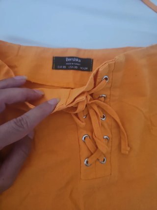 Conjunto naranja falda y top