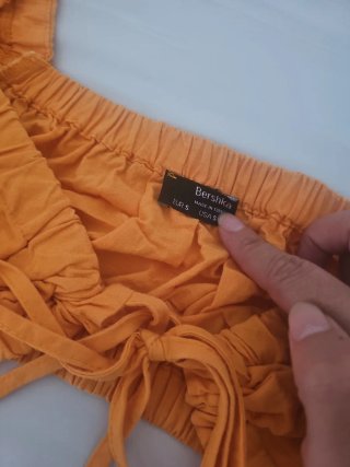 Conjunto naranja falda y top