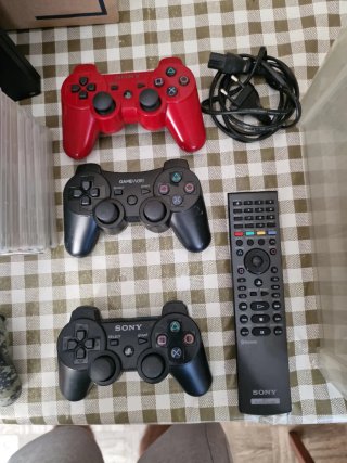 Pack PS3 + 2 mandos y juegos