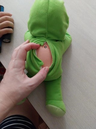 Muñeco Cuquin verde. Habla y canta