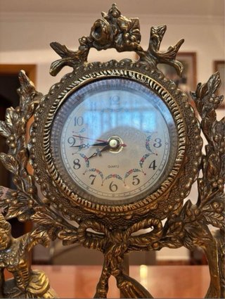 Conjunto reloj de sobremesa y candelabros vintage