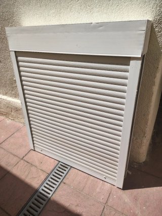 Ventana PVC con persiana y reja