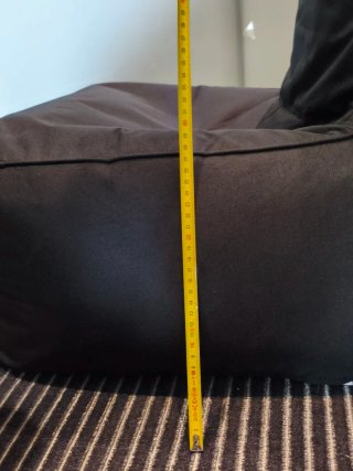 Puf - Silla Bean Bag negro con respaldo alto.