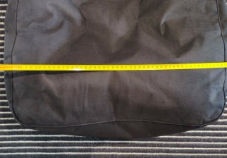 Puf - Silla Bean Bag negro con respaldo alto.