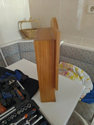 Reloj de pared de madera con 3 botes