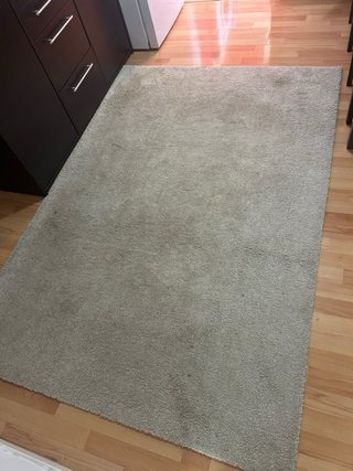 Alfombra beige de tela
