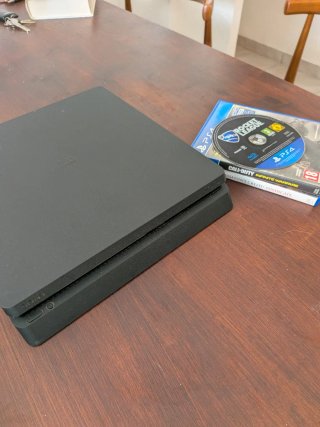 PS4 Slim 1TB Negra + Mando Azul + Juegos
