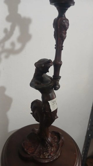 Candelabro antico in ottone brunito