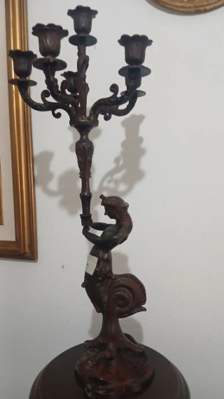 Candelabro antico in ottone brunito