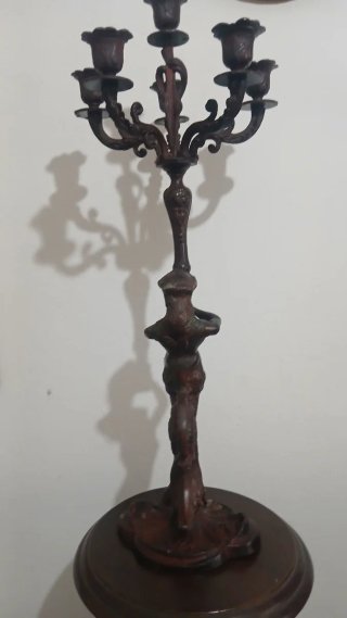 Candelabro antico in ottone brunito
