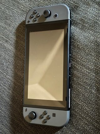 Nintendo Switch Gris completa + Caja + Funda Zelda