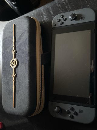 Nintendo Switch Gris completa + Caja + Funda Zelda