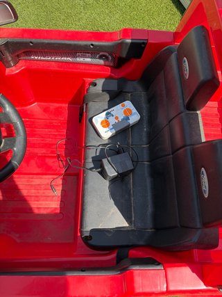 Coche eléctrico infantil rojo