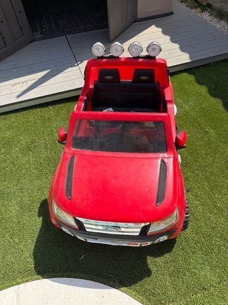 Coche eléctrico infantil rojo