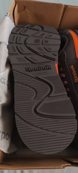 Botas de seguridad Reebok grises y naranjas