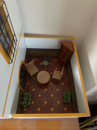 Casita de madera para muñecas