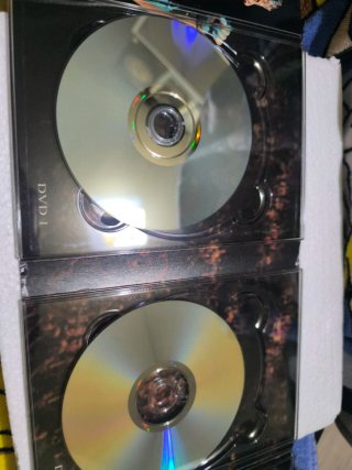 Firma de David Bisbal en la portada del álbum Todo