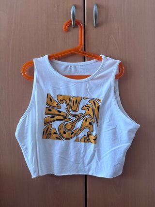Camiseta sin mangas con estampado de caras
