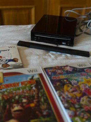 Nintendo Wii con mandos y juegos