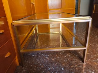Mesa de centro cristal y metal dorado