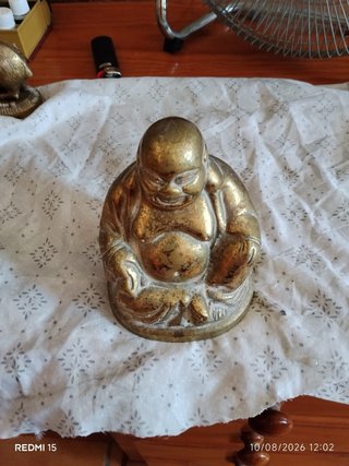 Buda antiguo de bronce