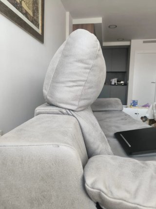 Sofá gris tela con asiento deslizante