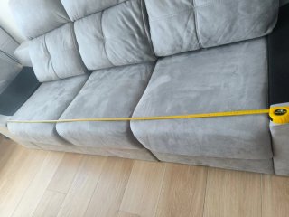 Sofá gris tela con asiento deslizante