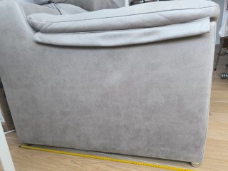 Sofá gris tela con asiento deslizante