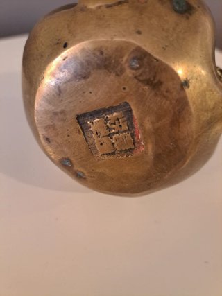 Figura "Cuatro Caras Buda" en metal