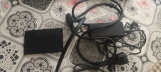 Cargador y tapa disco duro