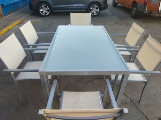 Mesa y 6 sillas de jardín