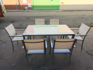 Mesa y 6 sillas de jardín