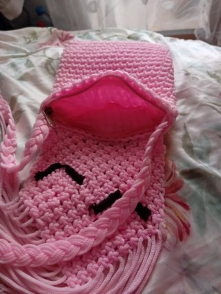 Bolso tejido a mano rosa