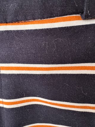 Pantalón corto de rayas marino y naranja