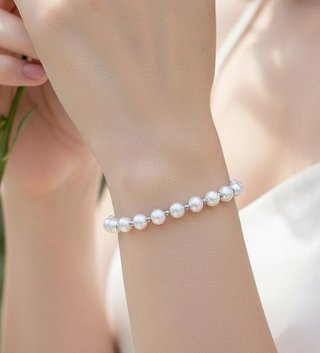 Pulsera de acero y perlas
