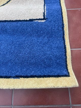 Alfombra infantil hipopótamo azul y amarillo