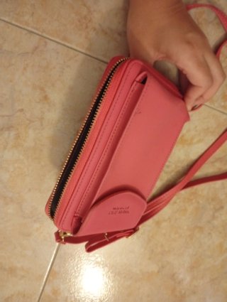 Bolso móvil y cartera rosa