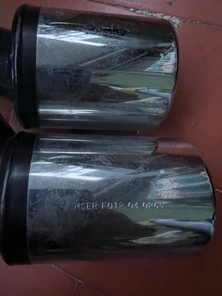 Cola de escape doble