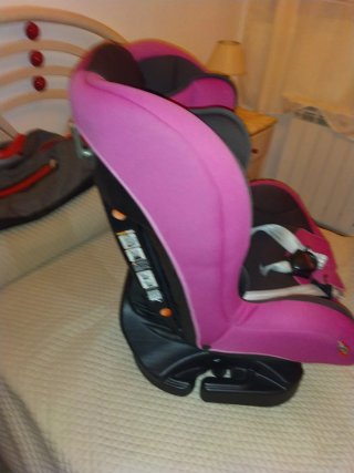 Silla coche bebé rosa y negra