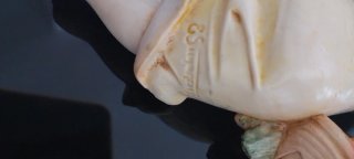 Figura de ángel con cesta de frutas los dos 20€