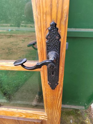 Puerta madera norte maciza con cristales