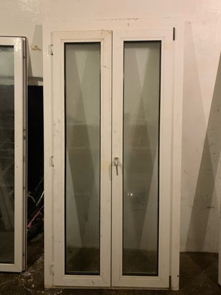 Puerta doble de cristal blanca